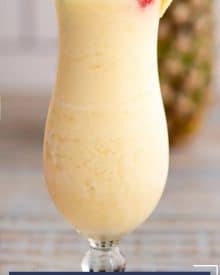 This Frozen Pina Colada is sweet, tropical, and perfect for a hot summer day! Easy to substitute with alternate rums, or even make it a virgin mocktail. #pinacolada #frozencocktail