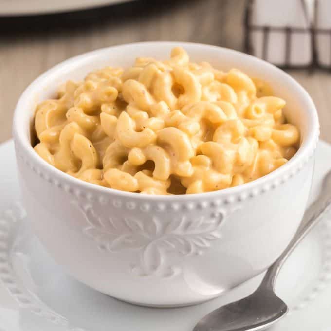 white bowl of creamy macaroni and cheese