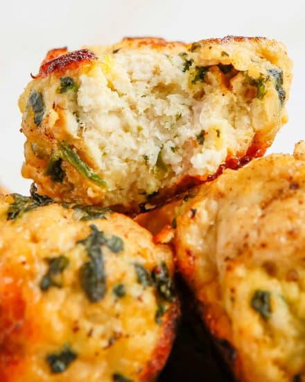 Juicy and full of amazing flavor, these Spinach and Feta Turkey Meatballs are perfect for a quick weeknight dinner, a fun appetizer, or meal-prepping for lunches! Easily made in the Instant Pot, oven or on the stovetop, you'll love the succulent texture. #meatballs #feta #turkey #greek