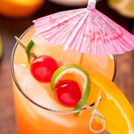 rum punch with paper umbrella garnish