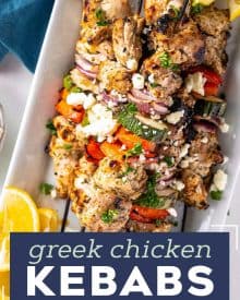 Juicy chicken thighs marinated in an ultra flavorful lemon and herb yogurt sauce, skewered with veggies and grilled to perfection. Perfect for summer, but recipe has alternative cooking methods for winter too! #chicken #greek #kebabs