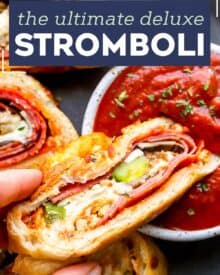 This Stromboli is loaded with Italian meats, cheeses and vegetables, and all wrapped up in a crispy cheesy crust. Like a deluxe pizza, all rolled up like a burrito. Great for a busy weeknight when you use store bought pizza dough! #pizza #stromboli #italian