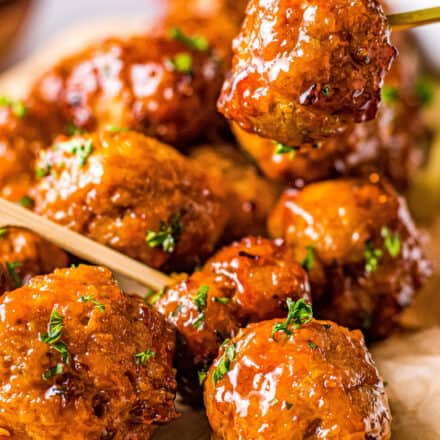 No more boring chicken meatballs! These Firecracker Chicken Meatballs are delicious on their own, but SO much better with the sweet, savory and spicy firecracker sauce! Perfect for a party or fun dinner! #appetizer #meatballs #firecracker #airfryer