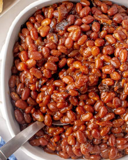 These Instant Pot "Baked" Beans are smoky, thick, tangy and sweet. Perfect as an easy side dish for any meal, and easy to make vegetarian if you prefer! #bakedbeans #instantpot #pressurecooker