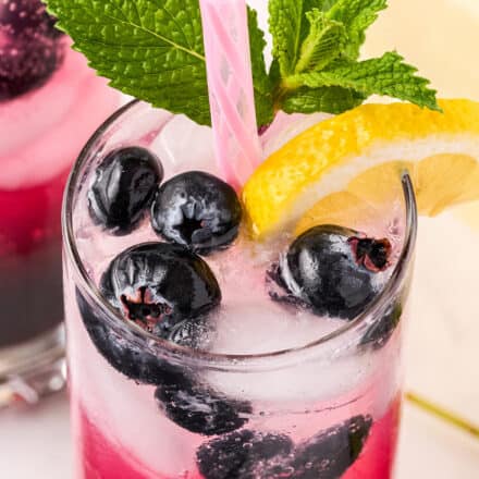 sparkling blueberry lemonade with straw
