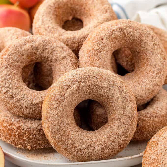 pile of apple cider donuts on plate