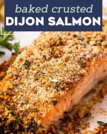 This Baked Crusted Dijon Salmon is light and flaky, and ready in just 30 minutes. Tender salmon filets are brushed with a honey dijon butter, then crusted with a mixture of breadcrumbs, pecans, and herbs and spices. It's the perfect quick and easy weeknight dinner! #salmon #dijon #easydinner