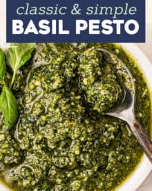 This Classic Basil Pesto recipe is made in just 15 minutes with plenty of fresh basil, parsley, pine nuts, garlic, olive oil and Parmesan cheese. Perfect on pasta, sandwiches, drizzled over veggies or pizza, stirred into Alfredo sauce, used in soups, and more! #pesto #sauce #Italian