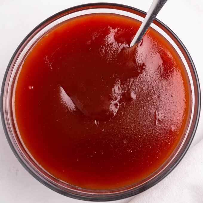 overhead view of sweet and sour sauce in clear bowl