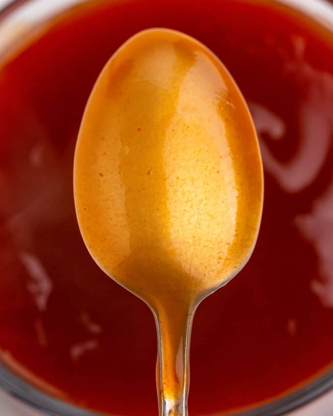sweet and sour sauce coating the back of a spoon