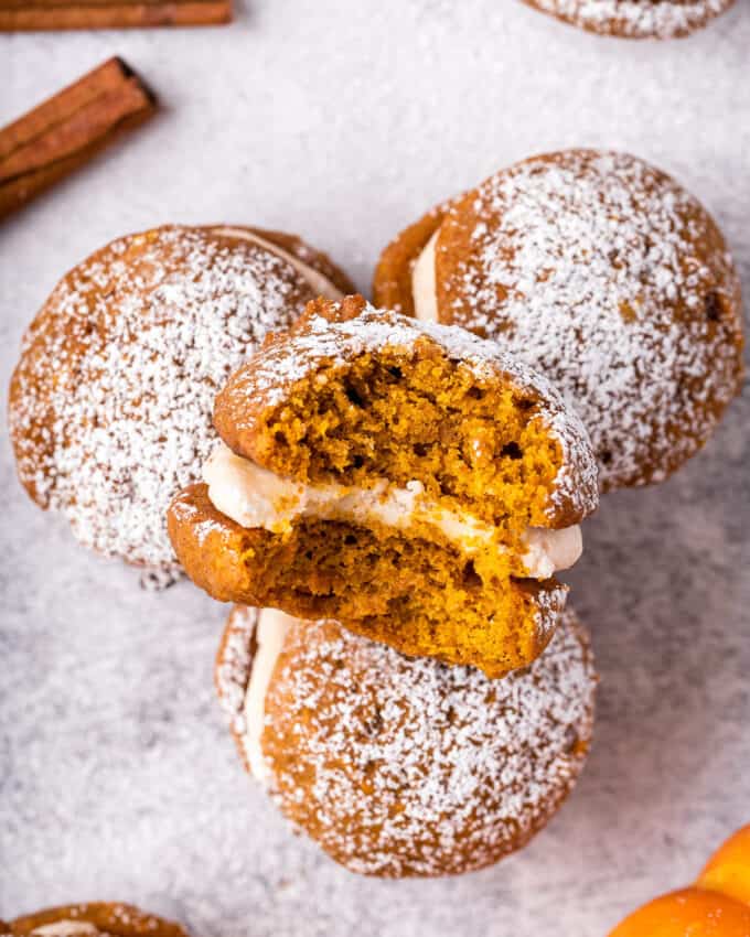 pumpkin whoopie pie with a bite taken out of it