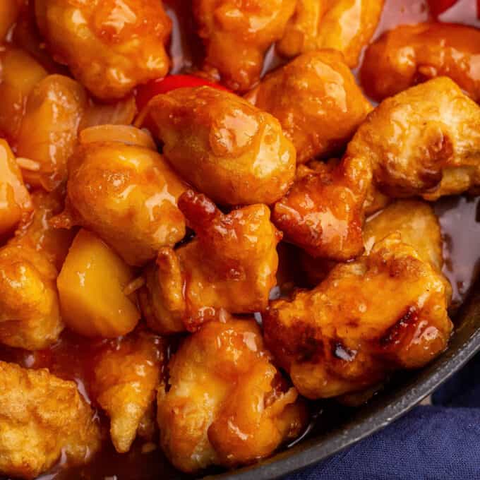 closeup of sweet and sour chicken in skillet