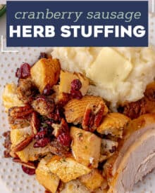 This Apple and Cranberry Sausage Stuffing is loaded with classic Fall flavors. The wine butter and herb broth makes for a fun and delicious stuffing recipe for Thanksgiving, Christmas, or even a great Fall dinner. #stuffing #Thanksgiving #holiday #sidedish