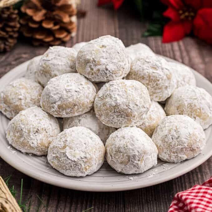 pile of snowball cookies on plate