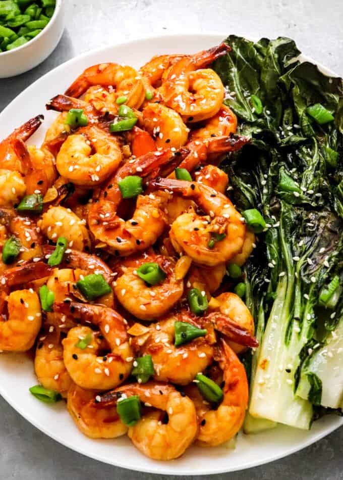 shrimp and bok choy on white plate