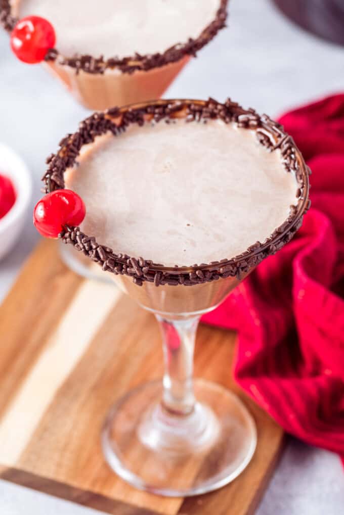 creamy chocolate martini with cherry garnish