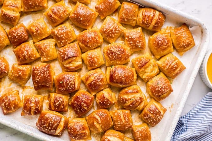 baked soft pretzel bites on baking sheet