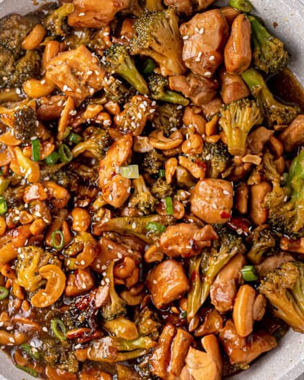 Tender chicken pieces are stir-fried with broccoli (or your favorite veggies), tossed in a savory sauce that's cooked down to a sticky sauce that perfectly coats the chicken! Made in one skillet, and ready in about 30 minutes, it's the ultimate weeknight dinner idea. Skip the takeout and make your own! #cashewchicken #chickenstirfry