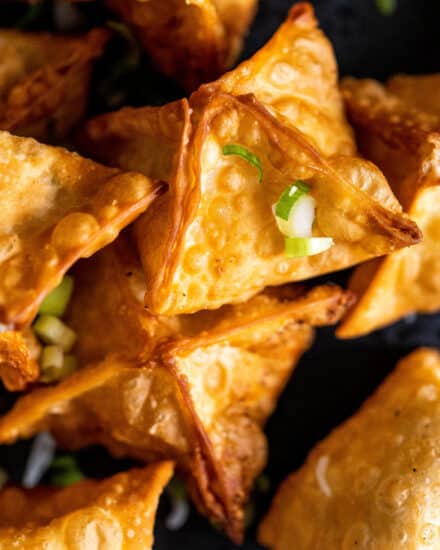 Even better than ordering takeout, this Crab Rangoon recipe is very simple to make, and is such an irresistible appetizer! Crunchy wonton wrappers wrapped around a creamy imitation crab meat filling... perfectly dip-able, and they're freezer-friendly too!