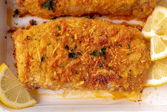 close view of pork chop on baking sheet