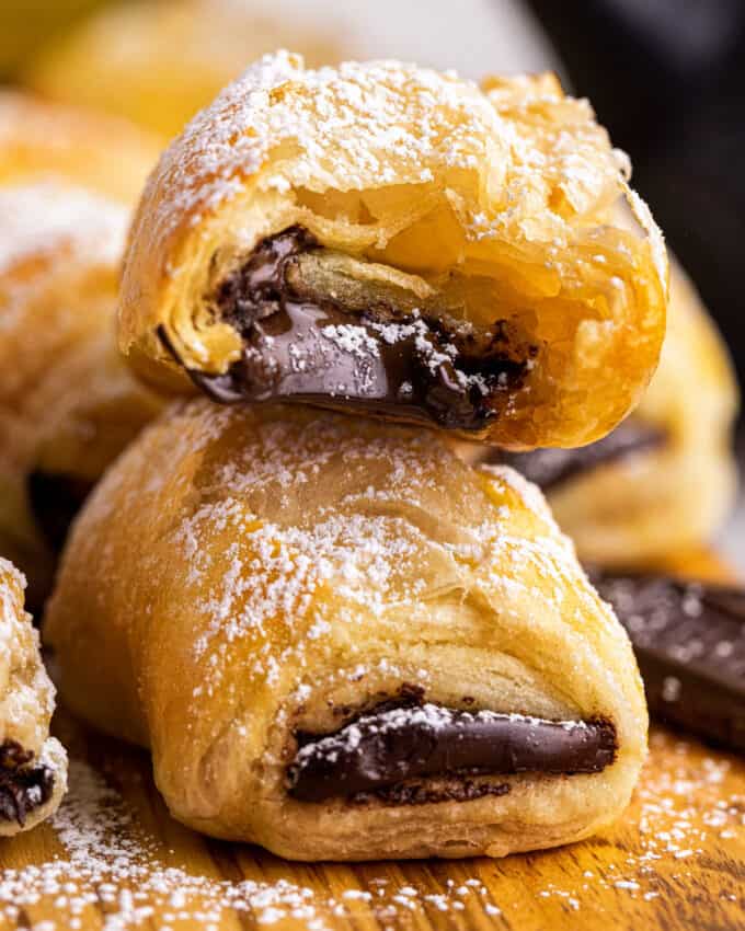 gooey chocolate croissants stacked on top of each other