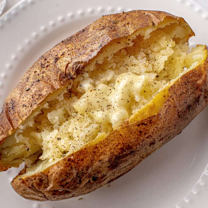 air fryer baked potato with butter salt and pepper