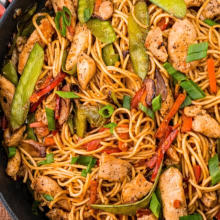 Better than takeout, this Chicken Lo Mein recipe comes together quickly, in one skillet, and is full of juicy chicken, tender lo mein noodles, and crisp tender veggies, all coated in a silky savory sauce!