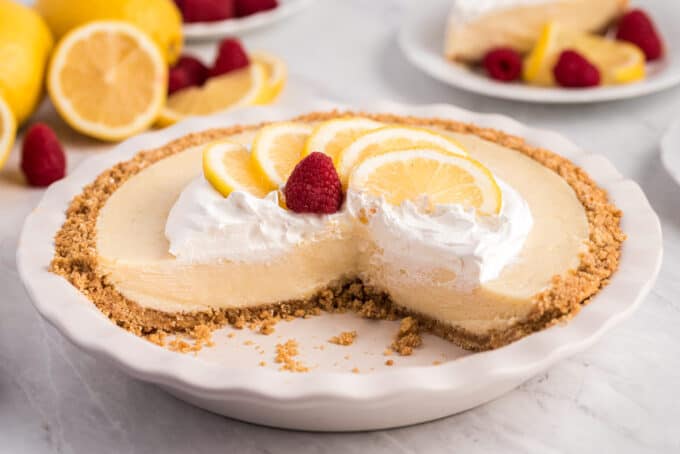 lemon cream pie with a couple of slices taken out