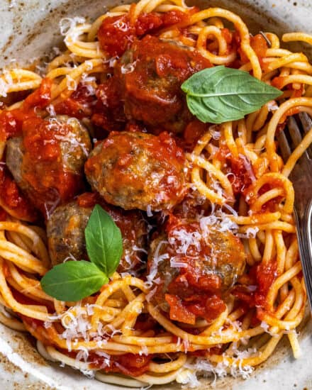 These Classic Italian-Style Meatballs are juicy and melt-in-your-mouth tender! Made with three types of meat, a panade, and packed with bold flavors, these meatballs are perfect to make ahead, freeze, or meal prep!