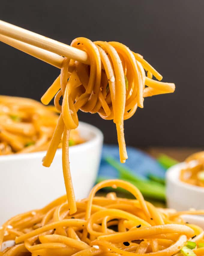 sesame noodles wrapped around chopsticks