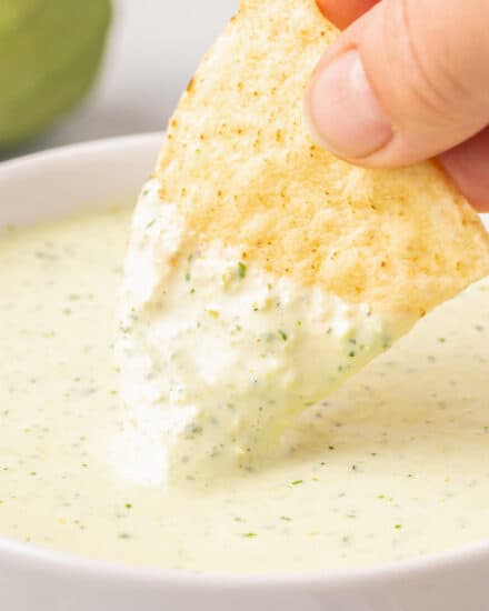 This bold and amazing creamy jalapeño dip is a very close copycat of the dip/sauce served at Chuy's restaurant. The tangy dip has just the right level of heat, and a creamy ranch flavor. You'll want to dip and drizzle this sauce on absolutely everything!