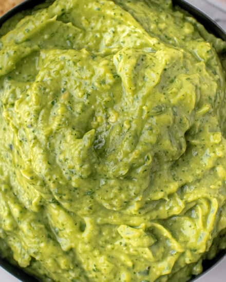 This easy avocado dip recipe is made with simple ingredients common in tex-mex foods. Smoky, spicy, and oh so creamy, this dip is great with chips, on tacos, burritos, and more!