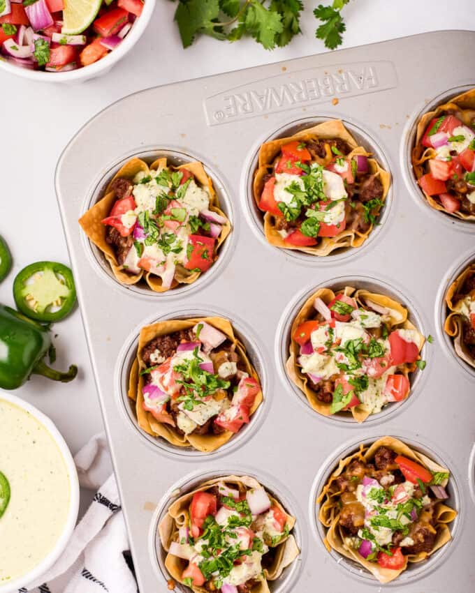 muffin pan full of taco cups