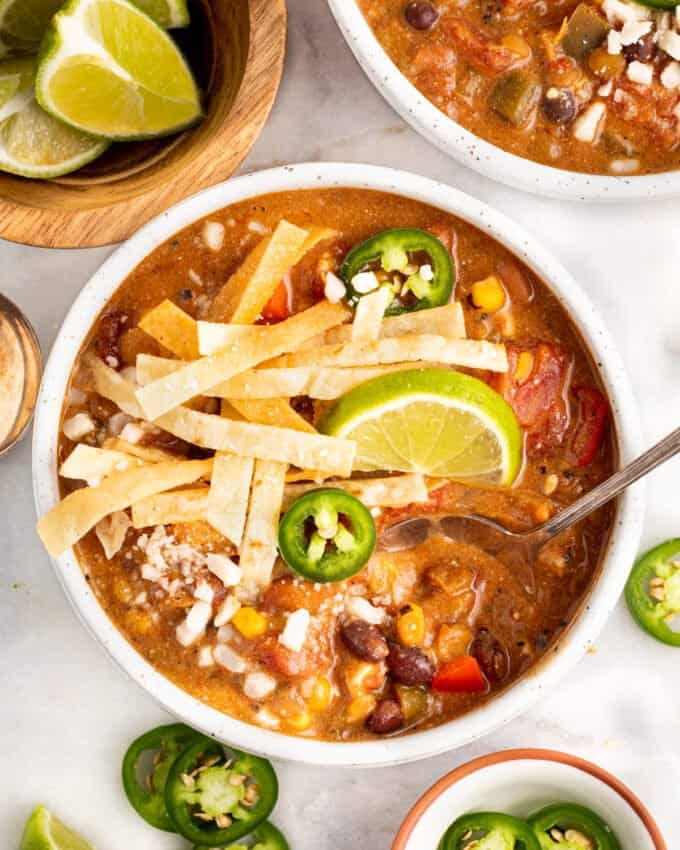 overhead view of two bowls of tortilla soup