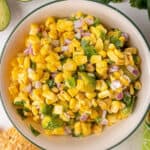 white bowl of corn salsa with avocado