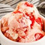 cherry pie ice cream in a white bowl