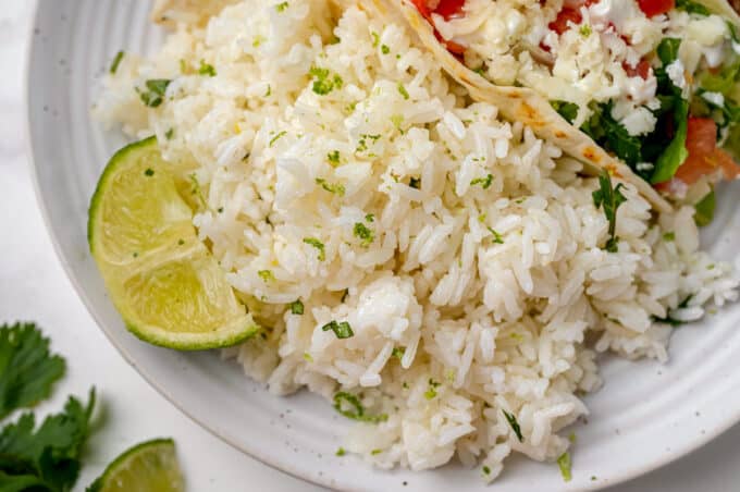 plate of tacos and cilantro lime rice