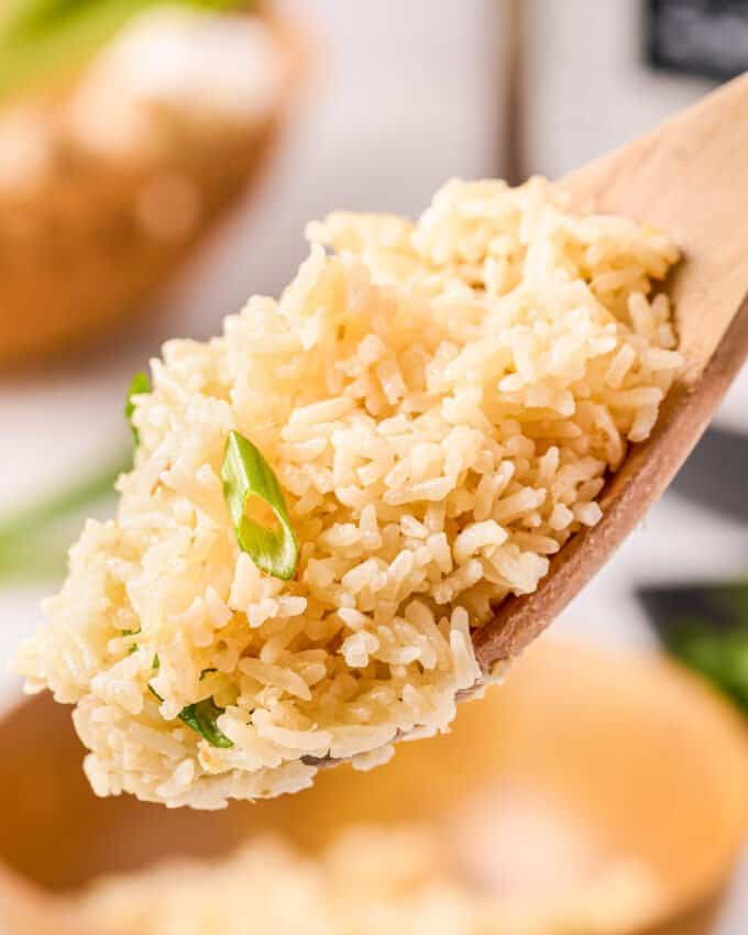 wooden spoon of ginger rice