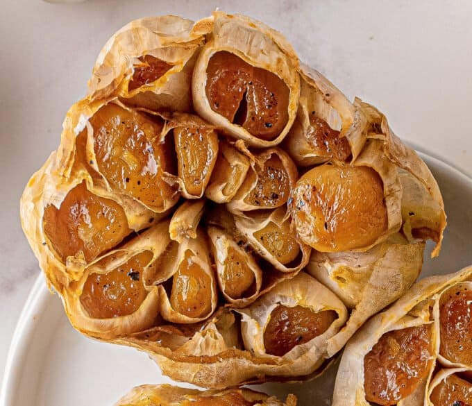 close up view of a head of roasted garlic