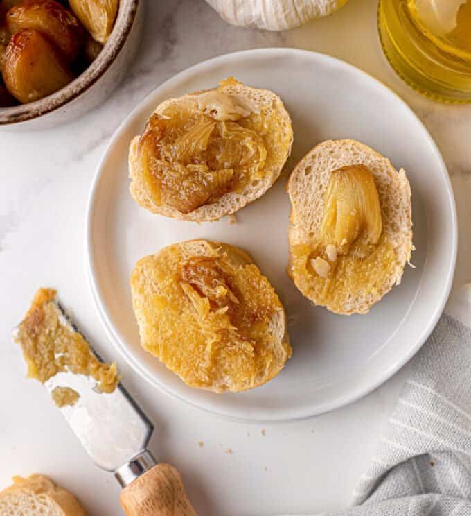 mashed garlic on pieces of bread