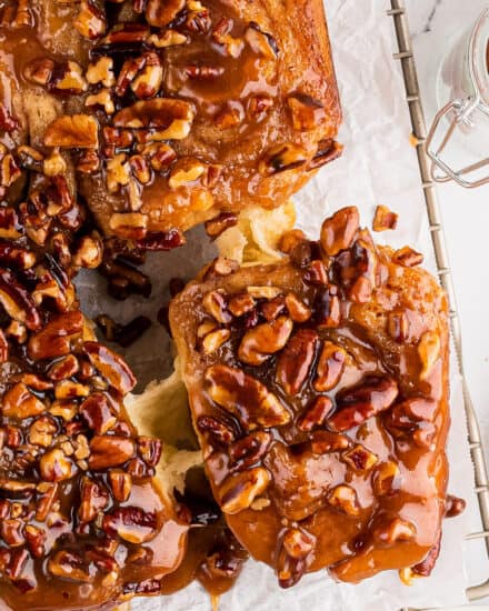 These caramel pecan sticky buns are so soft and fluffy, and absolutely dripping in a maple caramel sauce that is out of this world! They're easy to make ahead of time, and the perfect decadent breakfast/brunch treat!