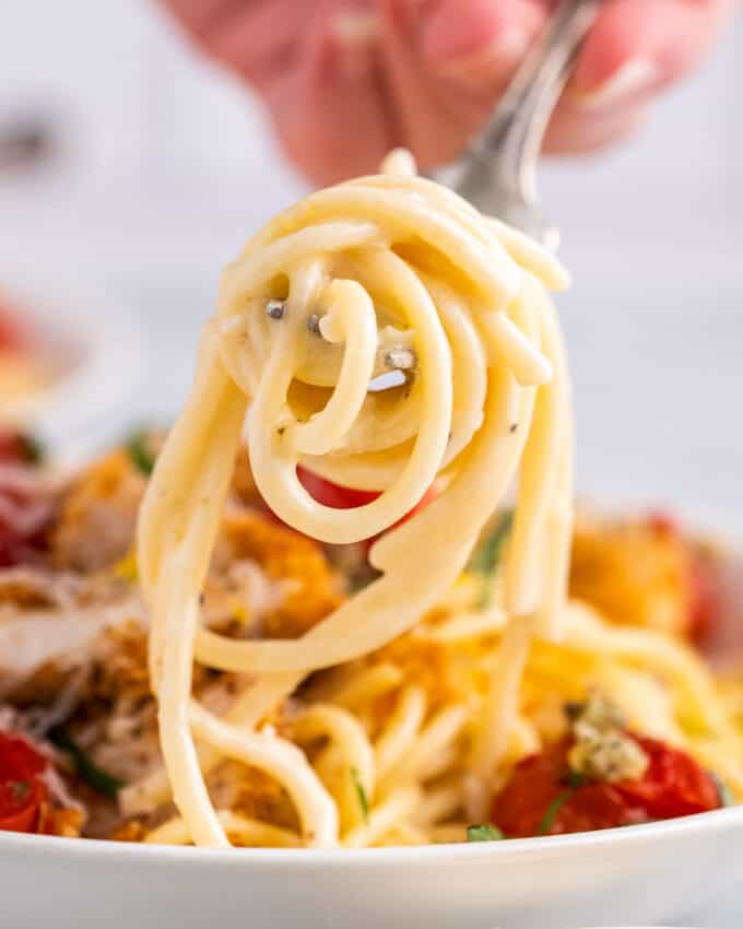 twirl of lemon chicken pasta on fork