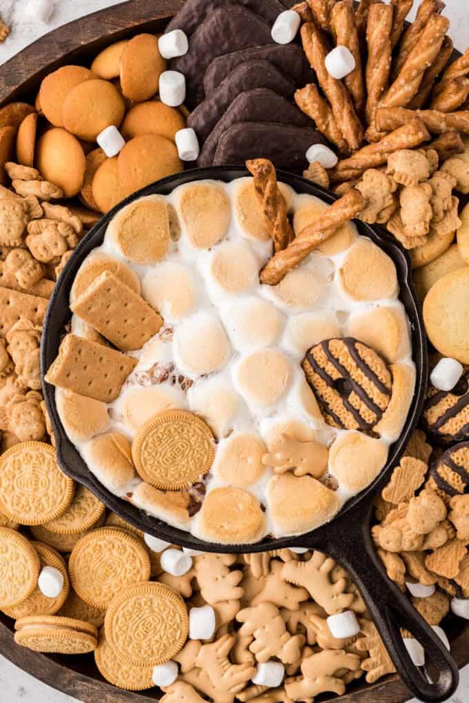 dessert board surrounding s'mores dip