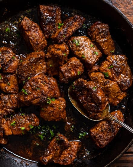 Juicy, tender morsels of cajun-spiced steak, seared in a hot skillet, then finished in a decadent garlic butter sauce! Perfect for a quick and easy dinner or fun appetizer.