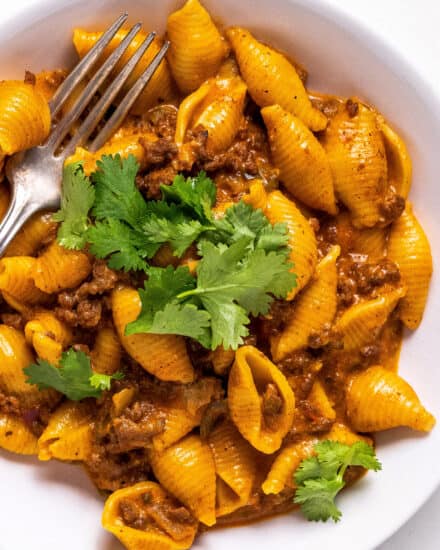 This taco pasta is a super simple one pot dinner that's hearty, cheesy, and made easily in the Instant Pot! The mild heat level makes this perfect for kids and families, but it's also easily customize-able!