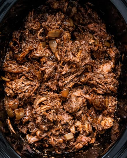 This honey balsamic pulled pork is succulent and tender, with a mouthwatering homemade honey balsamic bbq sauce! Made with simple and mostly staple ingredients, this pulled pork is perfect for a crowd, fantastic on a bun, and so much more.