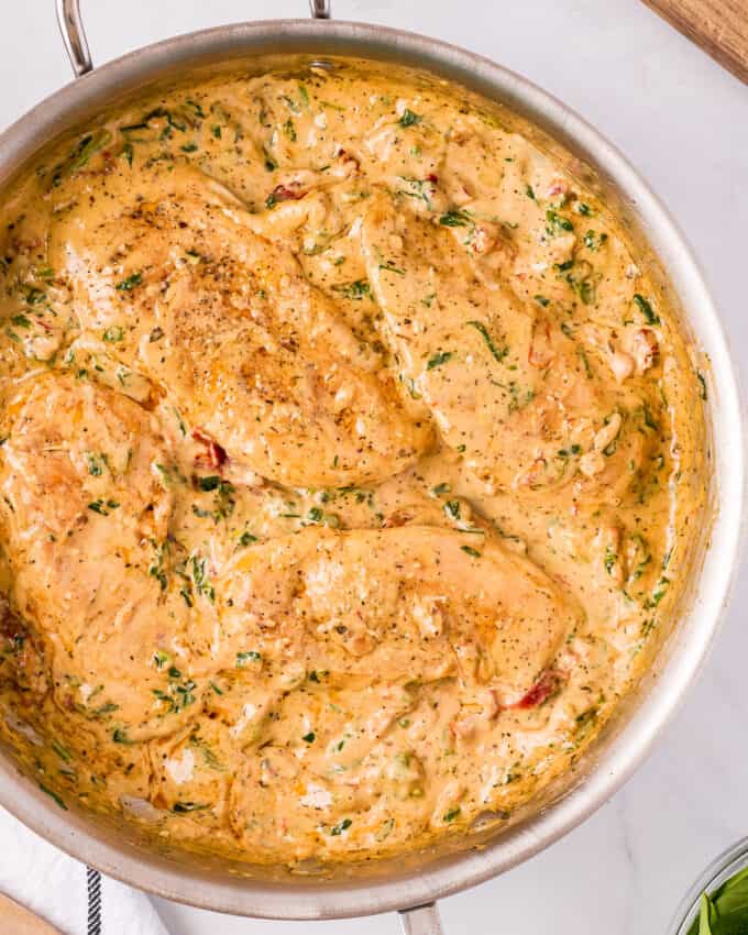 overhead view of tuscan chicken in skillet