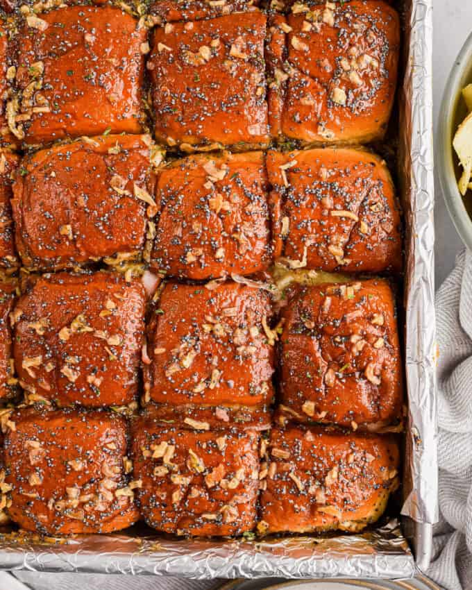 baking pan of baked ham sliders