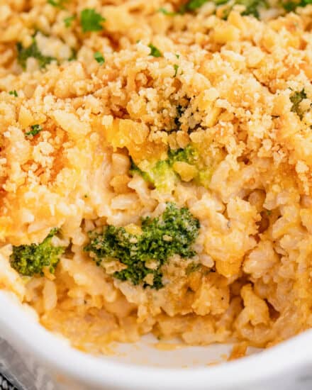 This delicious broccoli rice casserole is rich and cheesy, perfect for using up any leftover rice, and made from scratch with no "cream of" soups! The Ritz cracker topping adds the perfect buttery crunch!