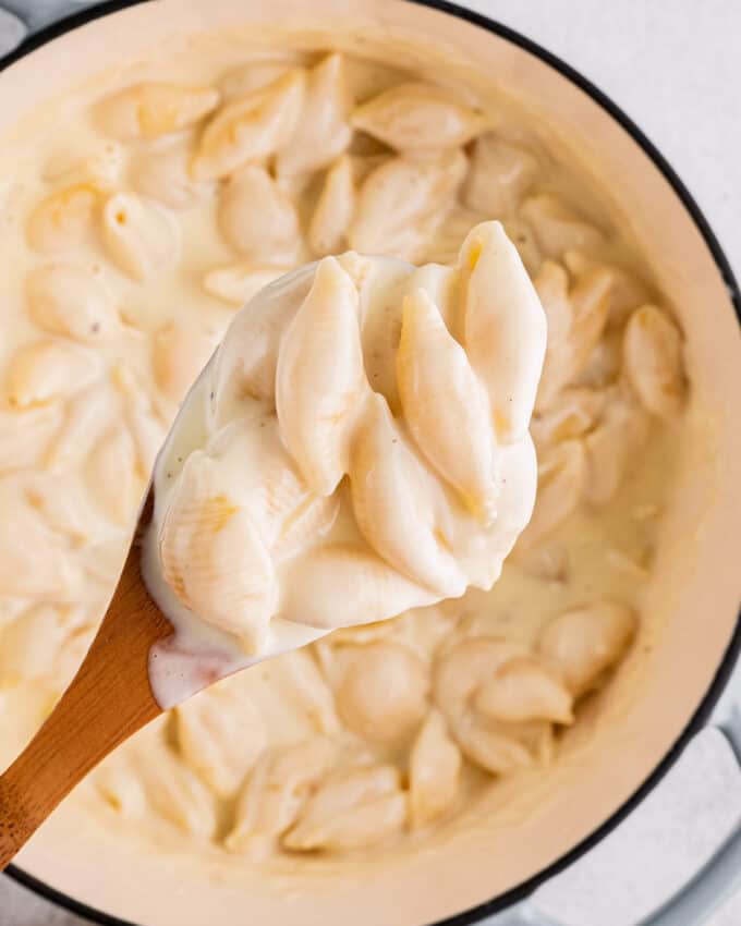 wooden spoon serving a copycat of panera mac and cheese
